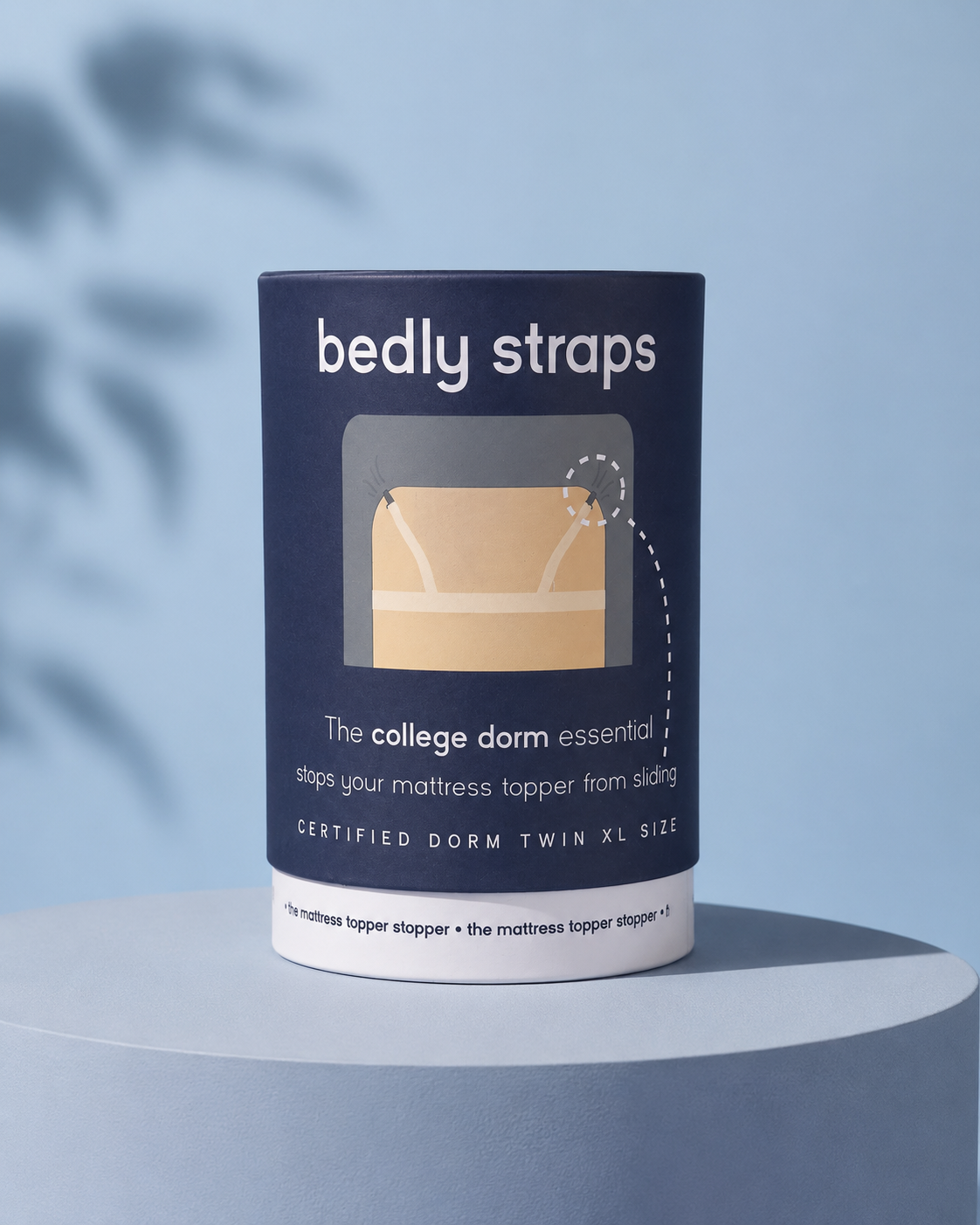 Bedly Straps packaging tube, the Twin XL mattress topper straps made for college dorm beds